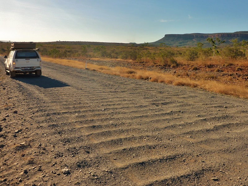 dried corrugated road surface